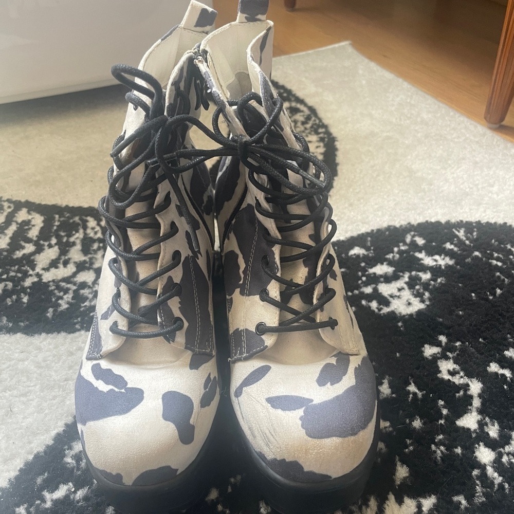 Cow print heeled boots